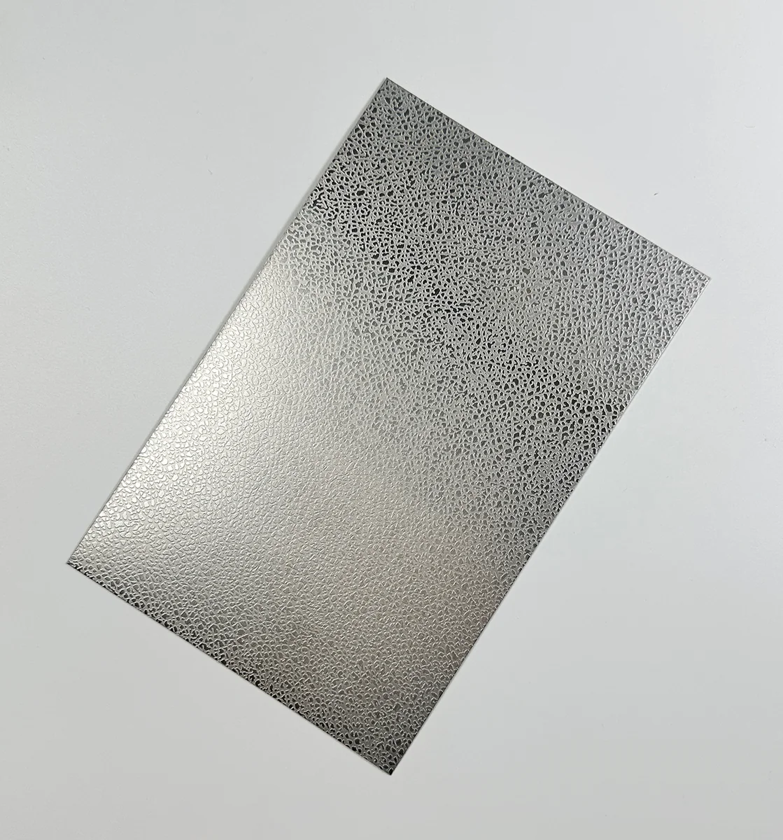Item A14 — 304 Sand-Finish Soft Leather Texture Stainless Steel Sheet sample.