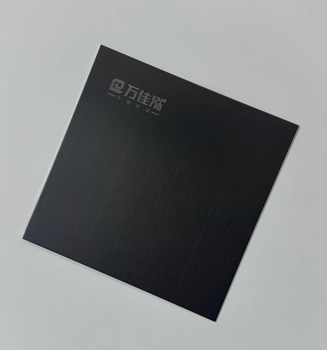 Item A15 — 304 Anti-Fingerprint Hairline Brushed Black Titanium Matte Stainless Steel Sheet sample.