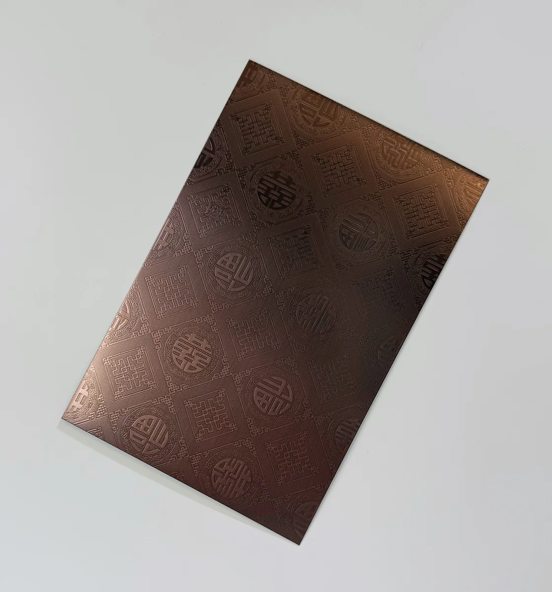 Item A26 — 304 Anti-Fingerprint Fortune Arrival Pattern Red Antique Bronze Stainless Steel Sheet sample.