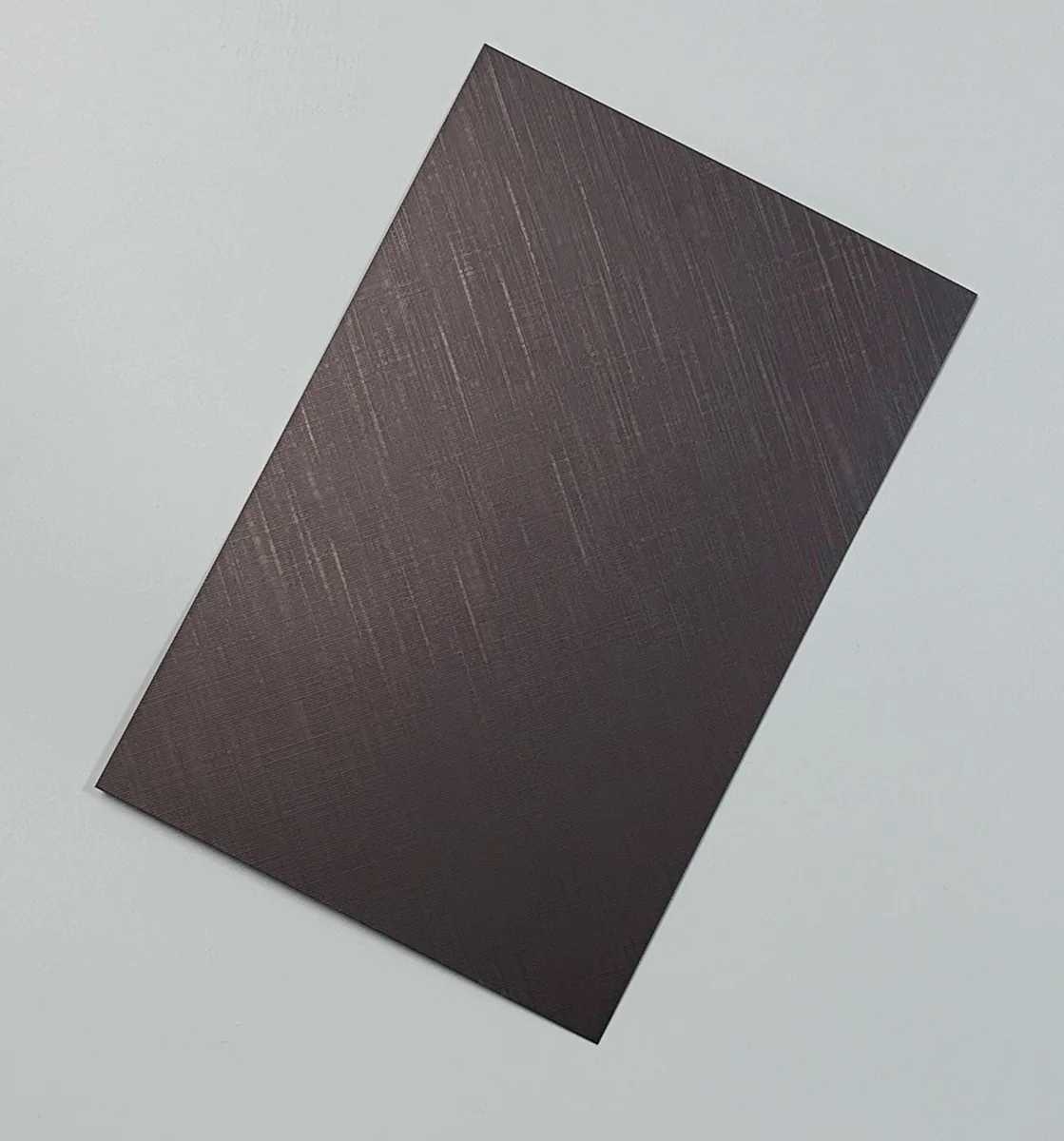 Item B39 — 304 Fabric Texture Antique Bronze Stainless Steel Sheet sample.