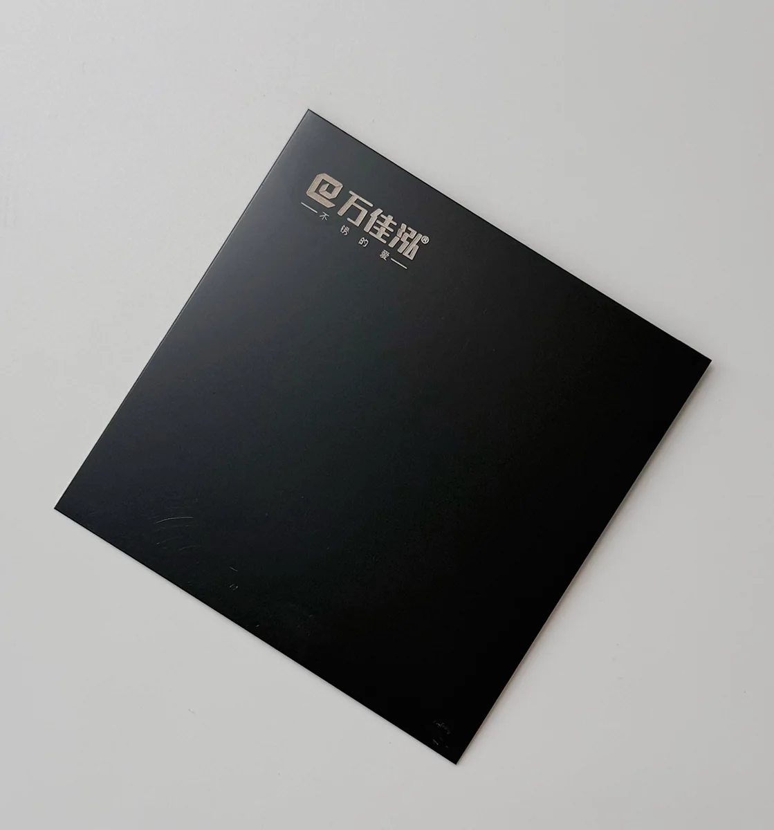 Item C11 — 304 Anti-Fingerprint 8K Sandblasted Black Titanium Matte Stainless Steel Sheet sample.