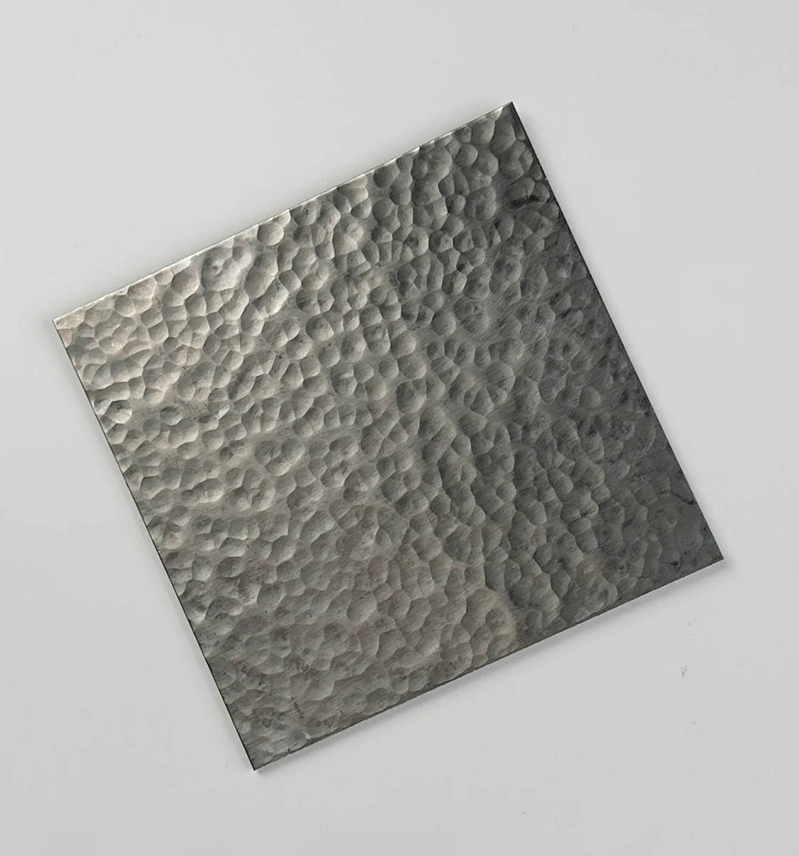 Item D04 — 304 2B Hammered Texture Stainless Steel Sheet sample.