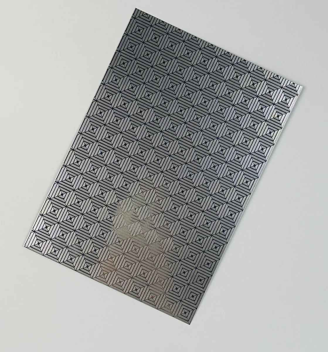 Item D34 — 304 Anti-Fingerprint 8K Hui Pattern Stainless Steel Sheet sample.