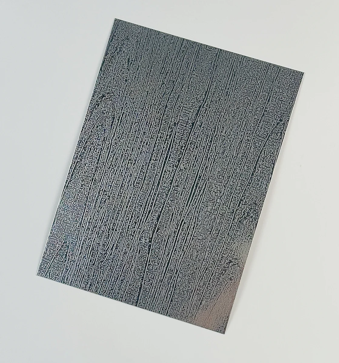 Item D35 — 304 Anti-Fingerprint 8K Bark Pattern Stainless Steel Sheet sample.