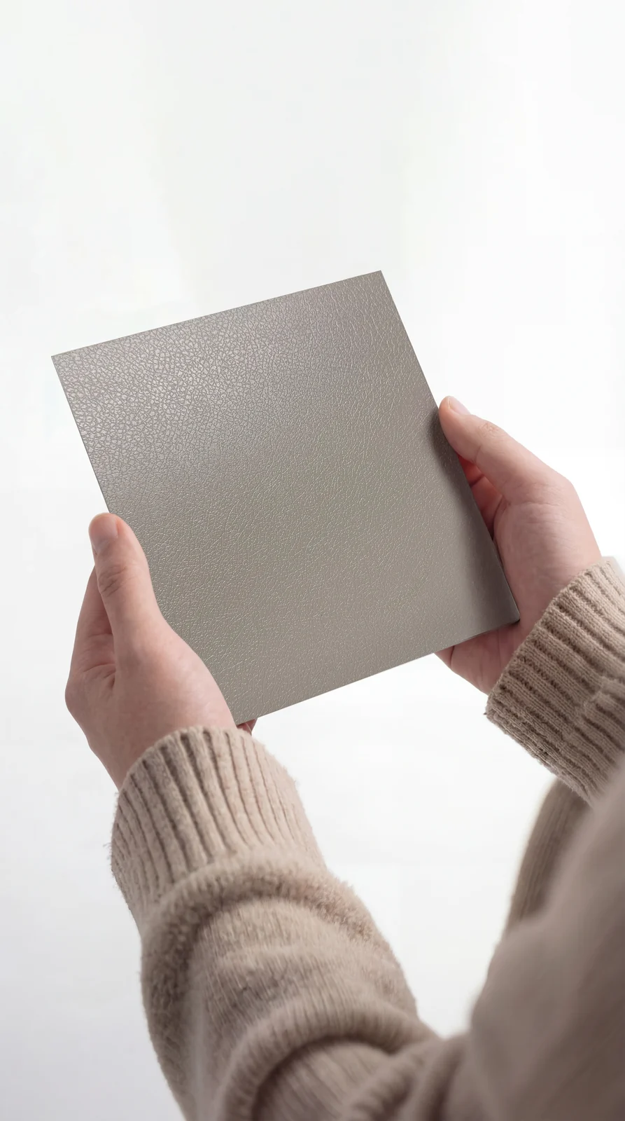 Hand-held fine leather texture decorative stainless steel sample in orchid grey
